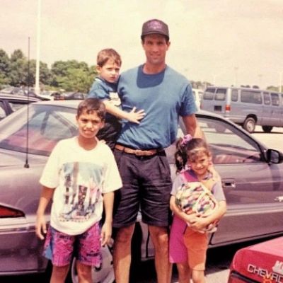 Photo of Kenneth Ray Sigman along with his father and two siblings